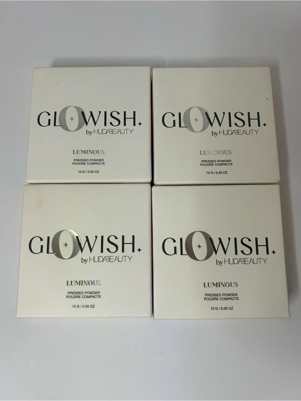 New Huda Beauty GloWish Luminous Pressed Powder 13 Extra Rich Lot Of 4. ‎ New in